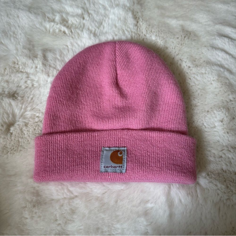Carhartt pink knit beanie (youth) but can fit a small woman’s head